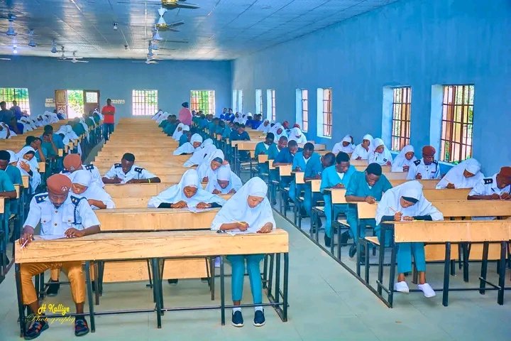SSC CGL Tier 1 Admit Card 2026 – students writing exam in examination hall